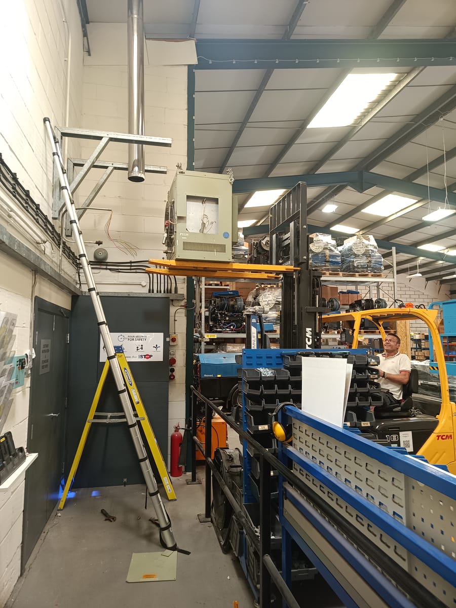 Forklift positioning a PGUH 100 commercial unit heater